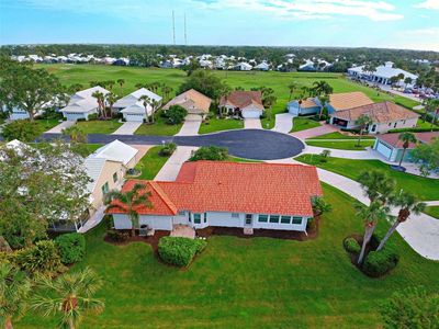 Beautifully set upon a large lot, on a cul-de-sac for very little road traffic. More to love: newer tile roof (?) and freshly painted exterior. | Image 3