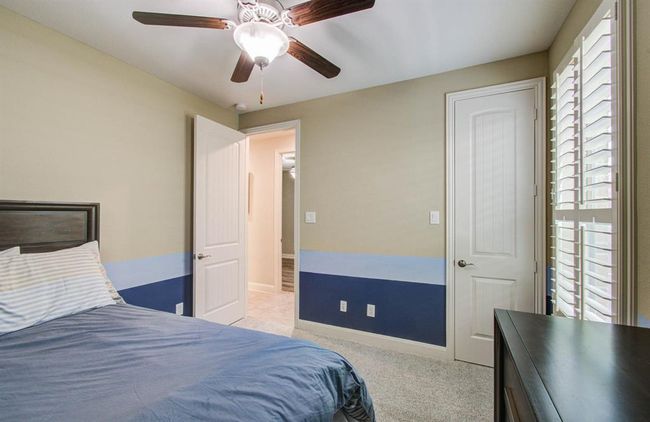 Bedroom 3, door on right leads to walk in closet. | Image 37
