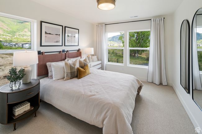 Bedroom with light carpet | Image 21