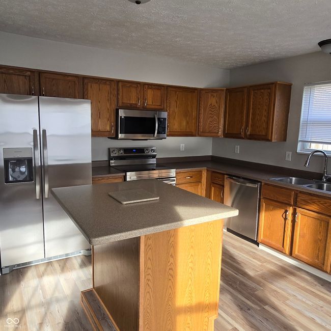 Island/breakfast bar with additional storage... | Image 16