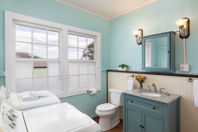 Bathroom also houses the washer and dryer. | Image 9