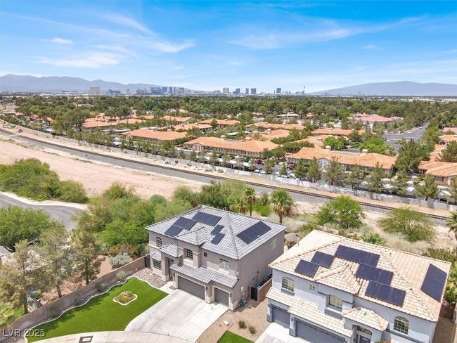 Aerial perspective of suburban area with a mountain backdrop | Image 45