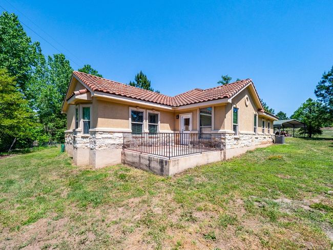 Back view of home and the back porch | Image 34