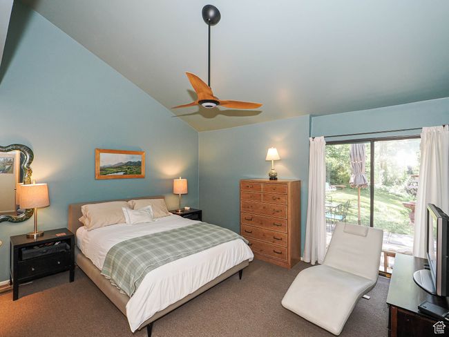 Bedroom with carpet, vaulted ceiling, and ceiling fan | Image 26