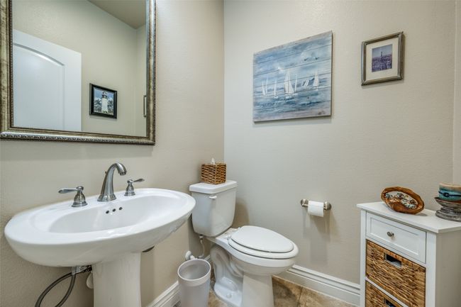 Guest Bathroom featuring baseboards and tile patterned flooring | Image 7