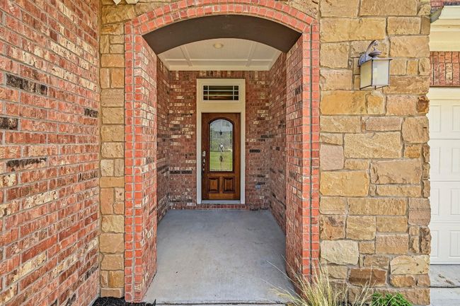 Doorway to property with brick siding | Image 4