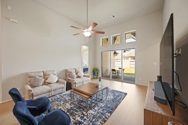 Abundant natural light poursthrough windows, creating a brightand inviting atmosphere. | Image 15