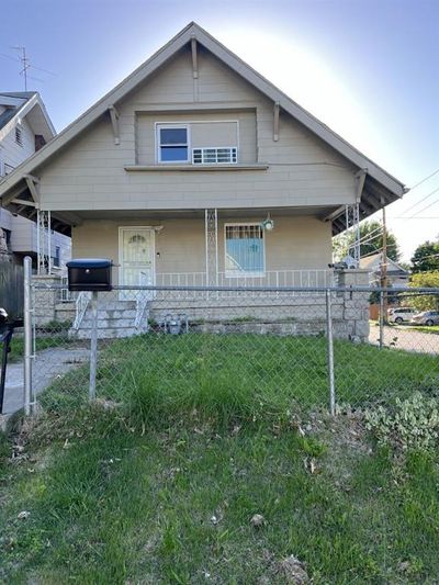 View of front of property featuring a front lawn | Image 2