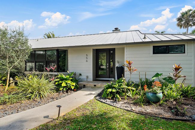 556 Sw Rustic Cir, House other with 3 bedrooms, 2 bathrooms and null parking in Stuart FL | Image 6