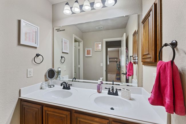 Bathroom featuring toilet and bathing tub / shower combination | Image 25