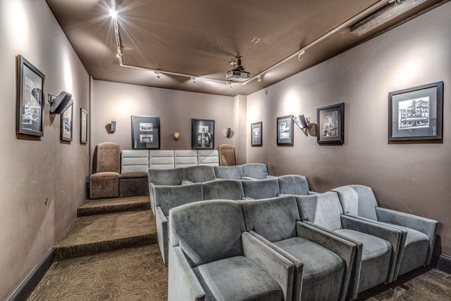 Among the HOA amenities, you'll discover a cozy small movie theater available for reservation through the community calendar. | Image 34