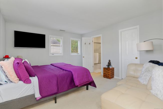 The primary bedroom looking towards the bathroom and walk-in-closet. | Image 17