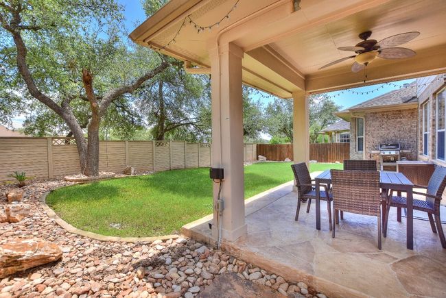 Lovely private back yard with mature live oak and the HOA maintains the back fence. | Image 33