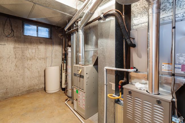 Utilities featuring gas water heater | Image 33