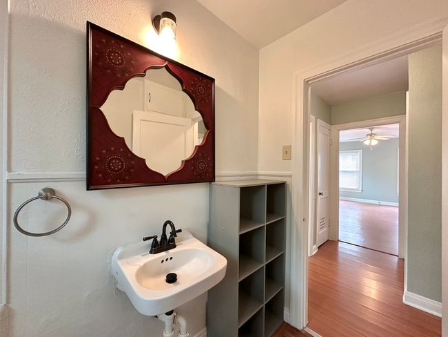 Bathroom with wood finished floors and a ceiling fan | Image 13
