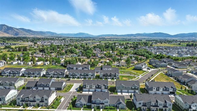 Aerial perspective of suburban area with a mountain backdrop | Image 31