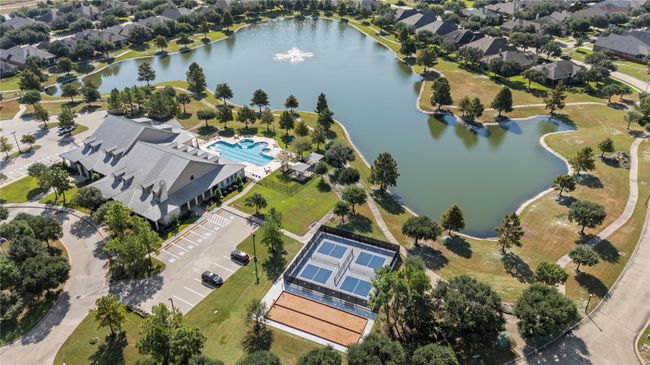 From lakeside strolls and scenic views to a sparkling pool, pickleball courts, and bocce ball, The Heritage at Towne Lake offers endless ways to stay active and connected, all just steps from home. | Image 44