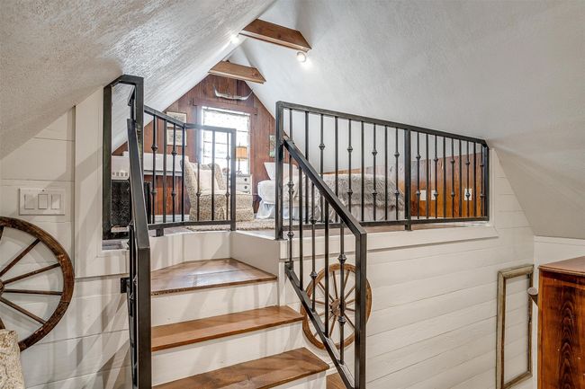 The stairs within The Attic suite up to the loft with XL Twin bed | Image 32