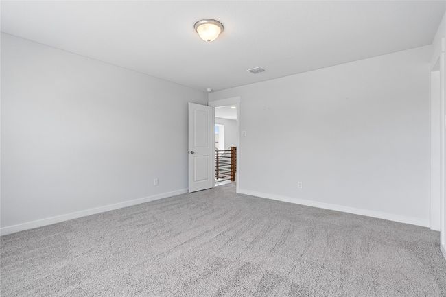 Empty room featuring carpet floors and baseboards | Image 27