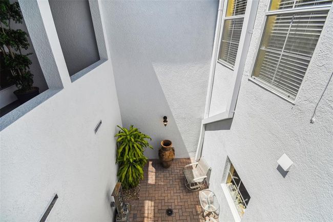 View downstairs from upstairs Patio | Image 51