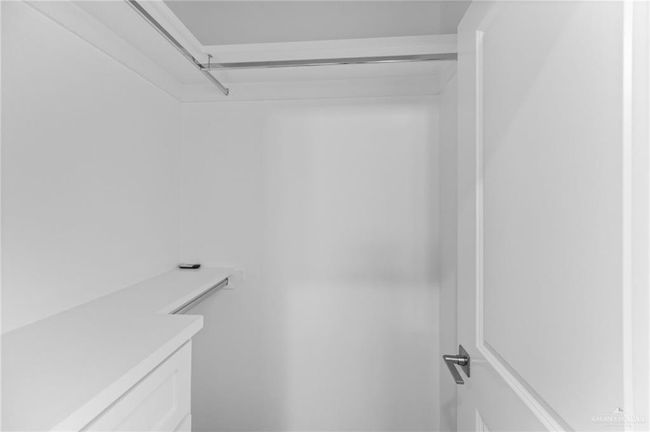 View of spacious closet | Image 13