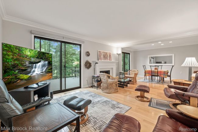 Living room with natural fireplace | Image 6