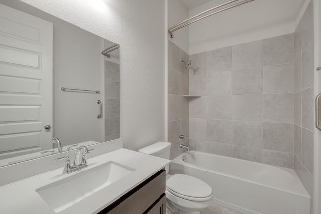 Bathroom with vanity and shower combination | Image 27