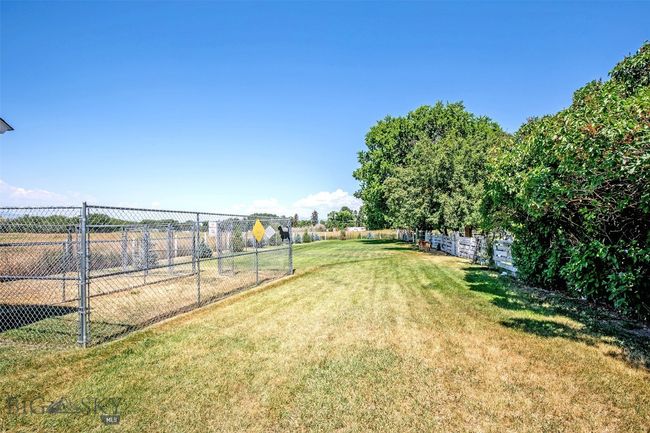 back of property with dog run | Image 27