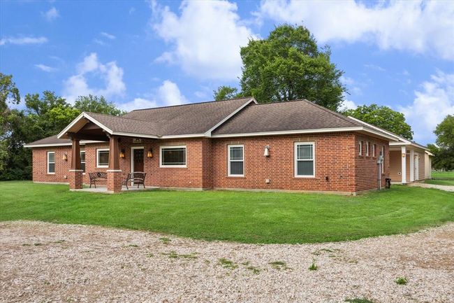 THE ROCK DRIVEWAY IS PACKED WELL FOR LARGE TRUCKS AND RECREATIONAL VEHICLES OR TRAILERS. THE ATTIC IS FULLY DECKED IN BOTH STRUCTURES. | Image 4