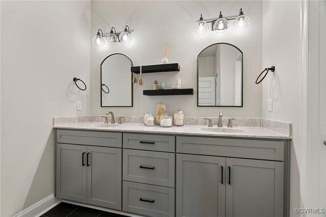 Bathroom with tile patterned floors and vanity | Image 19