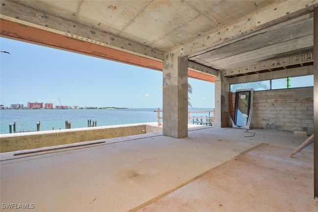 View of patio / terrace with a water view | Image 22