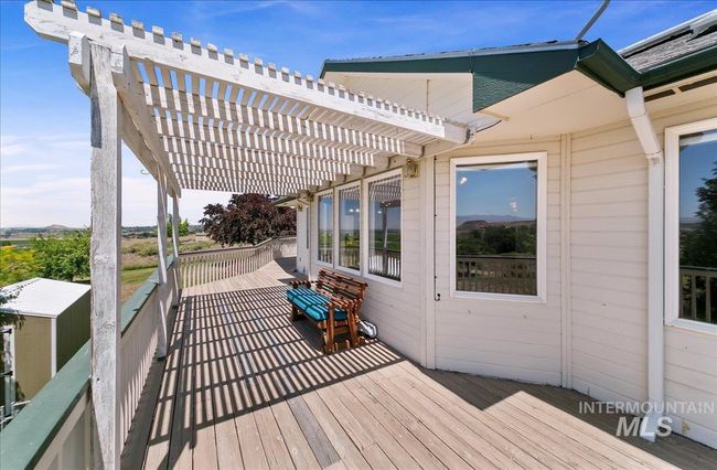 Deck with a pergola | Image 40
