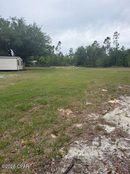 310 Melinda Cir, Southport, FL, 32409-2449 | Card Image