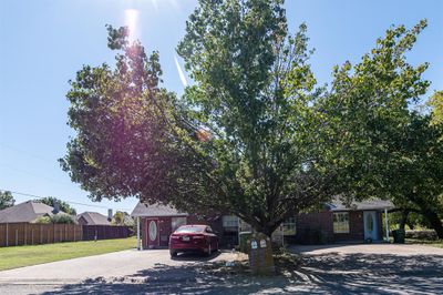 View of front of home with a front yard | Image 1