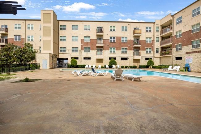 Community pool featuring a patio area | Image 5