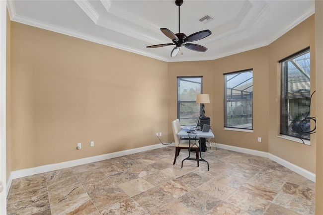 Office/flex space located off of kitchen and overlooking pool area | Image 58