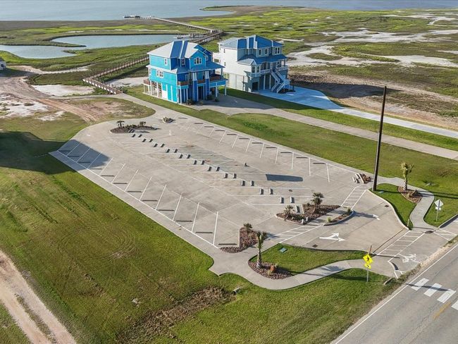 Hosting just got easier. Seahorse Estates includes a large community parking lot, making it seamless for overflow guests, renters, and friends to enjoy your home—without crowding your private driveway. A rare bonus for any beachside community. | Image 18