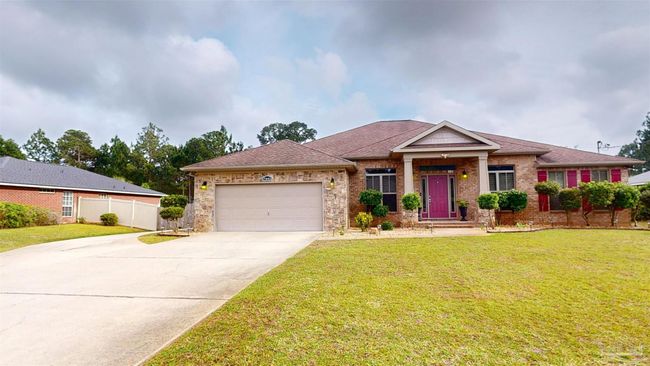 7445 Brevard St, House other with 4 bedrooms, 3 bathrooms and 6 parking in Navarre FL | Image 4