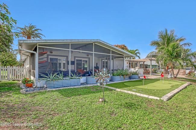 1061 Bali Rd, House other with 4 bedrooms, 2 bathrooms and null parking in Cocoa Beach FL | Image 42