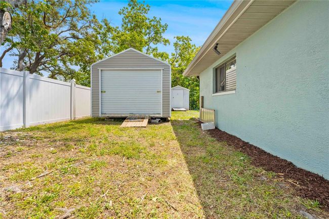 7660 Holiday Dr, House other with 4 bedrooms, 3 bathrooms and null parking in Spring Hill FL | Image 15