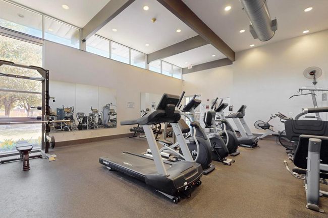 Gym with recessed lighting and a high ceiling | Image 39