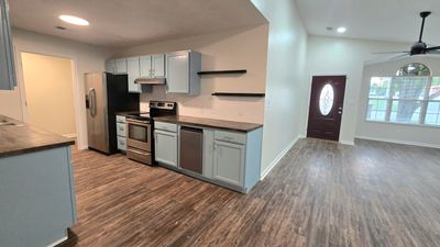 Freshly painted kitchen cabinets. | Image 3