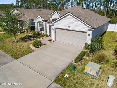 143 N Coopers Hawk Way, House other with 4 bedrooms, 2 bathrooms and null parking in Palm Coast FL | Image 2