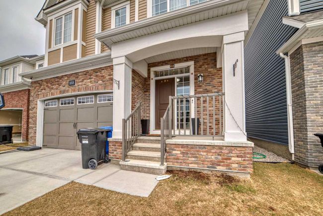 153 Carrington Close Nw, Home with 4 bedrooms, 3 bathrooms and 4 parking in Calgary AB | Image 2