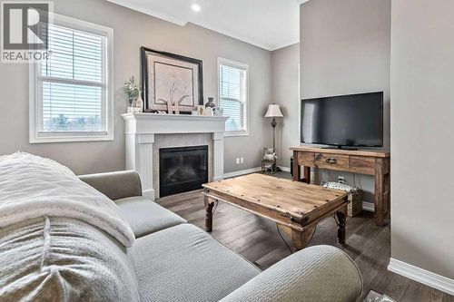 305-144 Crescent Rd W, Okotoks, AB, T1S1K2 | Card Image