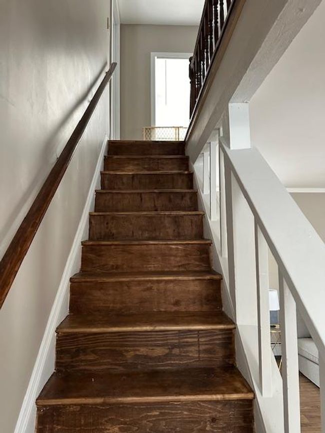 Stairway featuring hardwood / wood-style flooring | Image 5