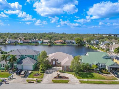 The home has a serene, west facing lake view, ideal for nightly sunsets. | Image 2