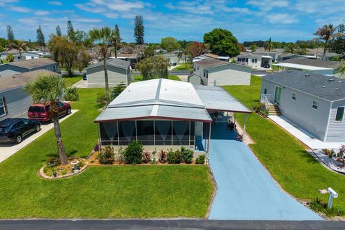 65 Manor Dr, Fort Pierce, FL, 34982-6311 | Card Image