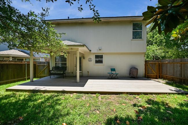 Back of property with a fenced backyard and a wooden deck | Image 19