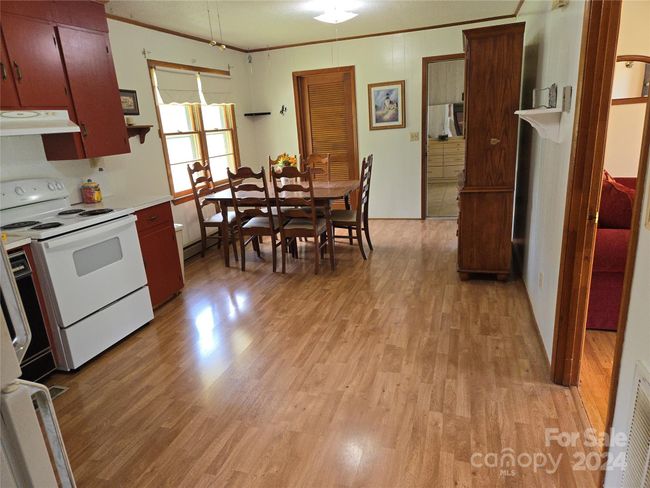 Expansive kitchen/dining area. Laundry through left door, bonus room thru right door | Image 6